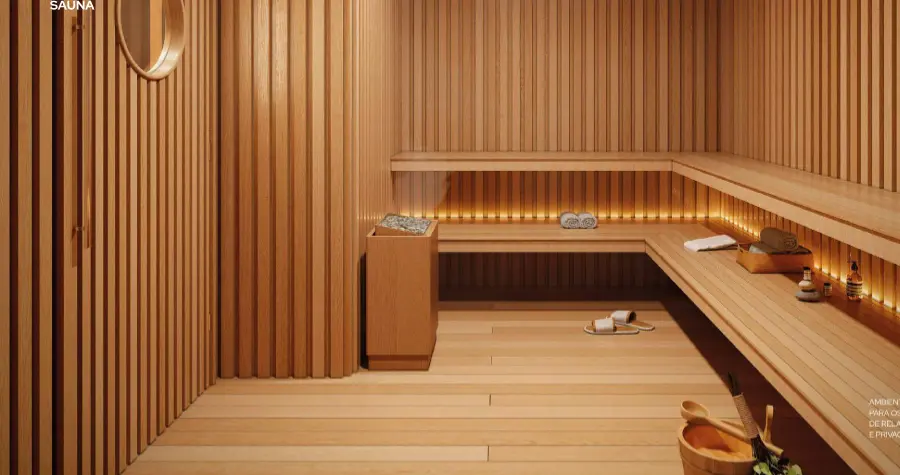 Sauna revestida em madeira com bancos em L